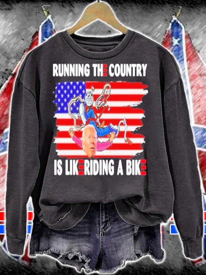 Biden Falls Of His Bike Running The Country Is Like Riding A Bike American Flag Shirt t-shirt sweatshirt