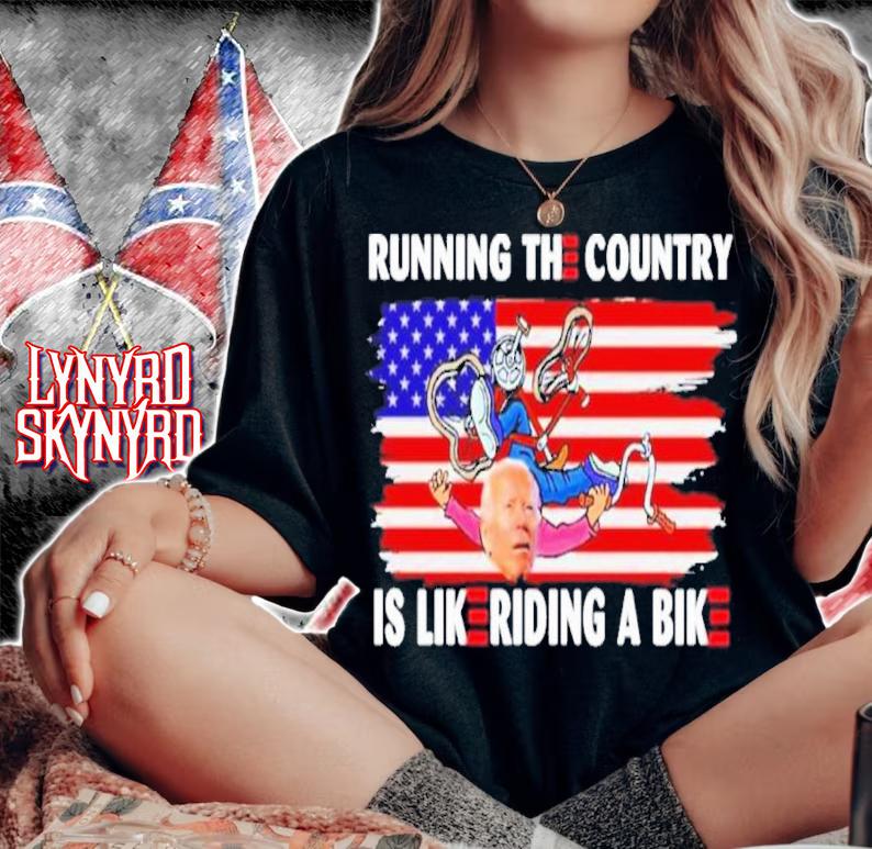 Biden Falls Of His Bike Running The Country Is Like Riding A Bike American Flag Shirt t-shirt woman shirt