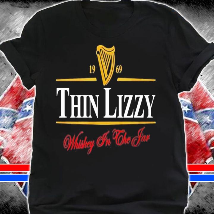 1969 Thin Lizzy Whiskey in the far shirt