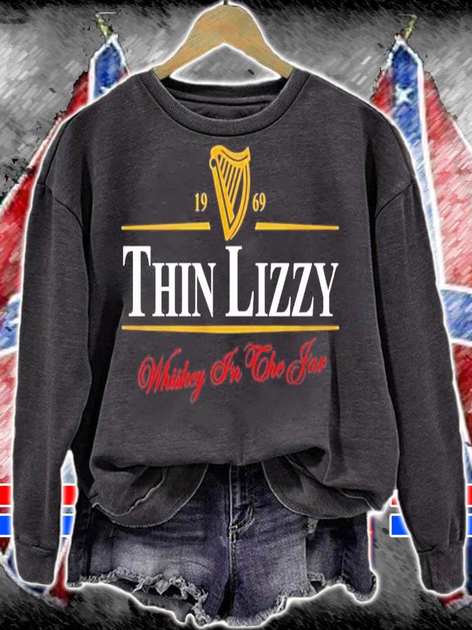 1969 Thin Lizzy Whiskey in the far shirt